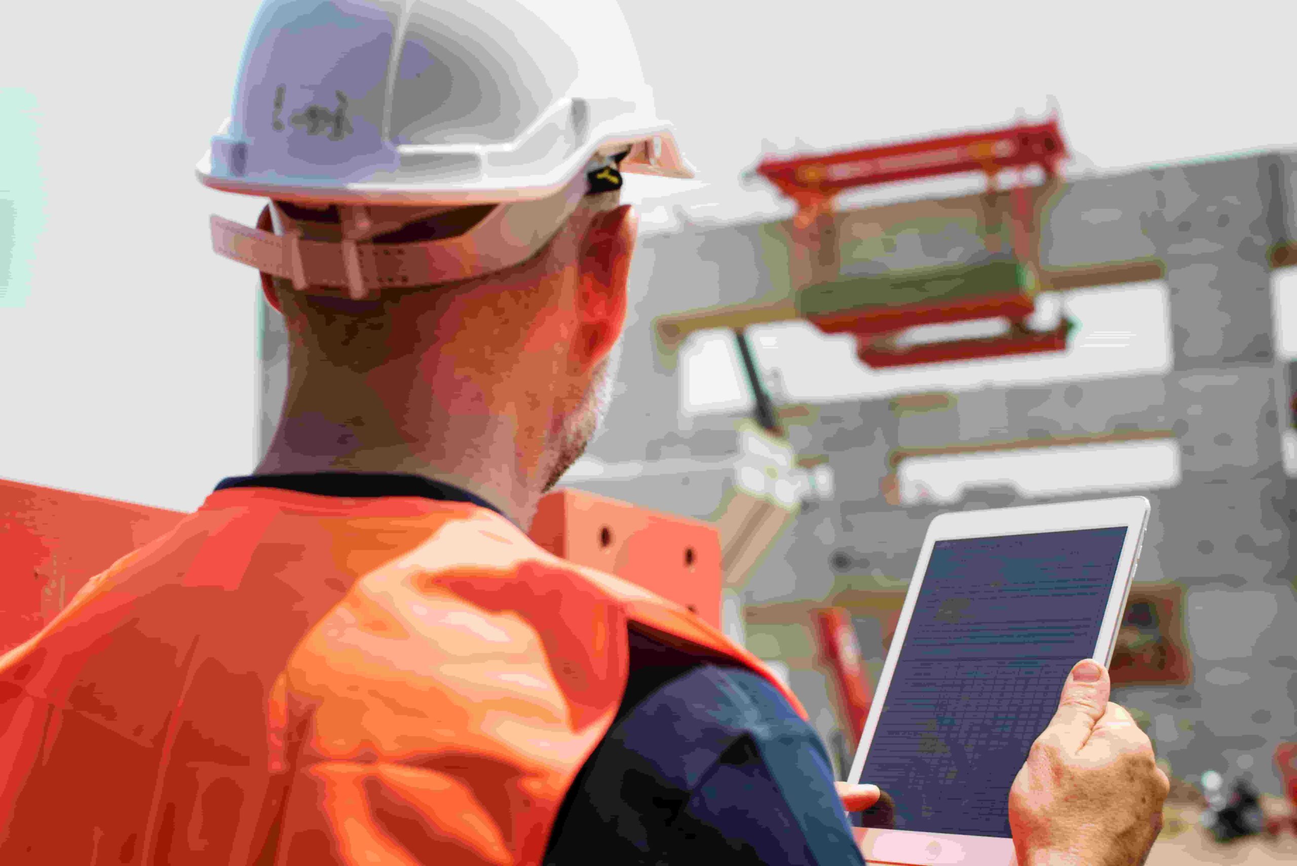 construction worker with an ipad
